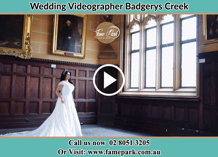 Bride standing near the church window Badgerys Creek NSW 2255