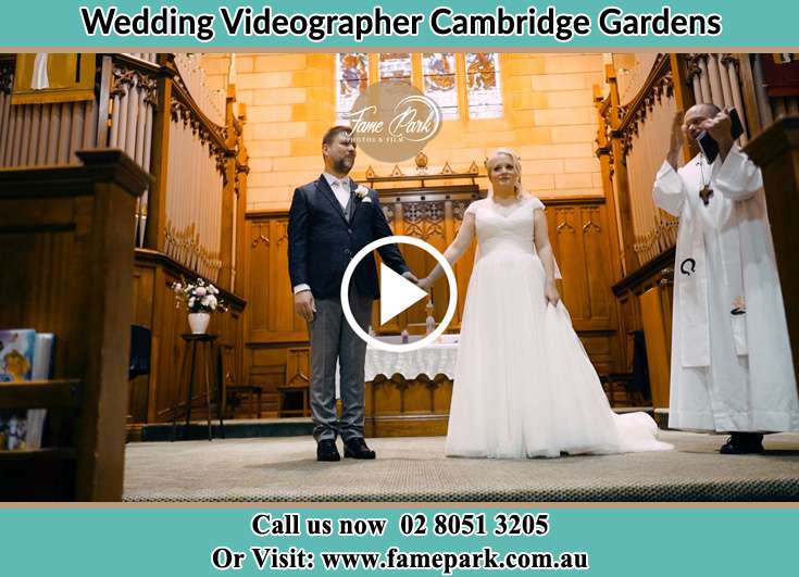 Bride and Groom at the altar with the priest Cambridge Gardens NSW 2747