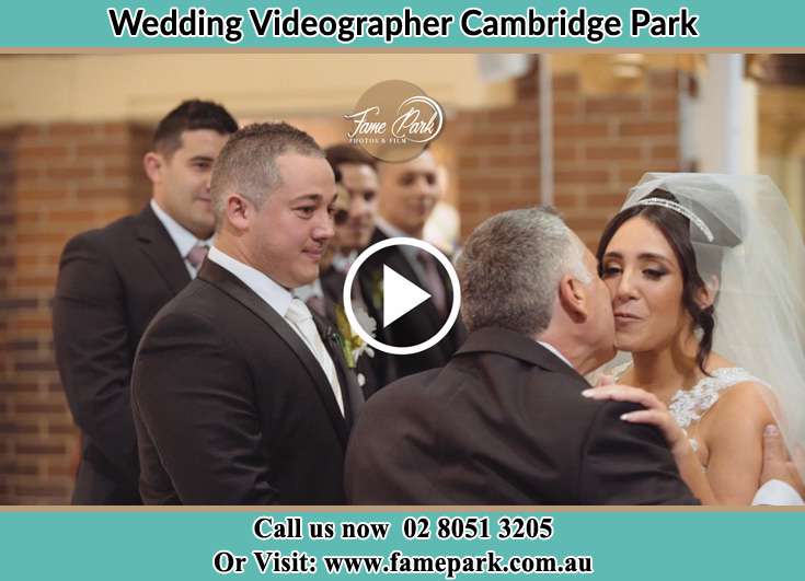 Bride and her father kissed during the event Cambridge Park NSW 2747