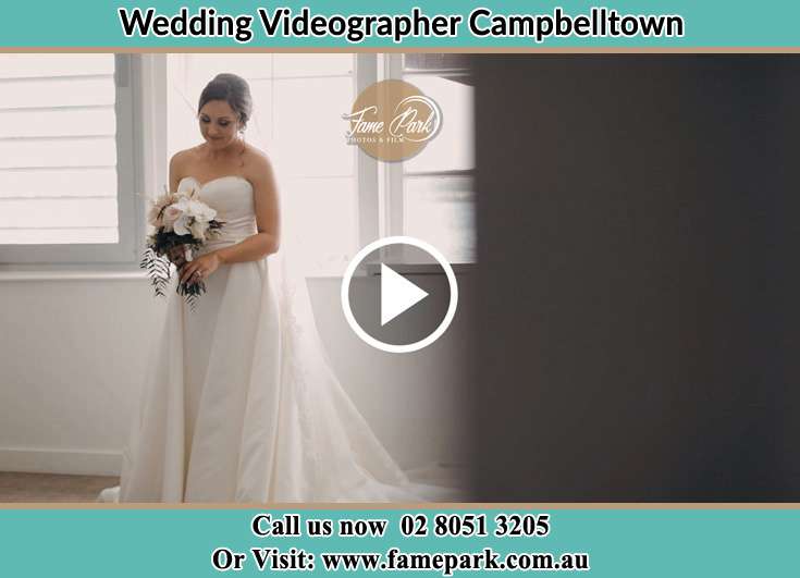 Bride holding a bouquet of flowers Camellia NSW 2124