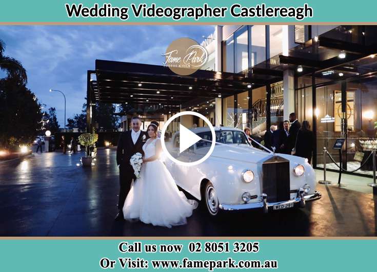 Bride and Groom beside their bridal car Castlereagh NSW 2749