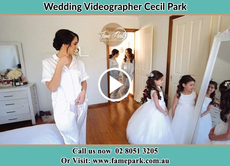 Bride looking at the mirror with her secondary sponsors Cecil Park NSW 2178