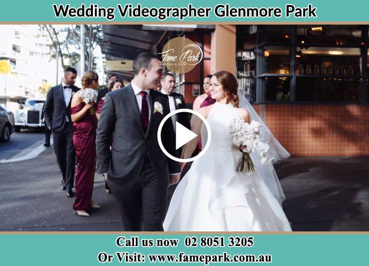 Bride and Groom looking at each other while walking Glenmore Park NSW 2745