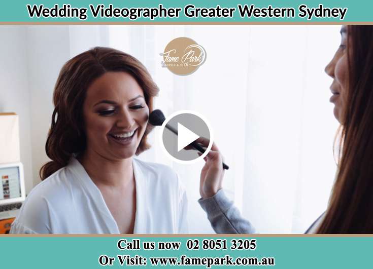 Bride getting ready and the stylist putting her make up Greater Western Sydney