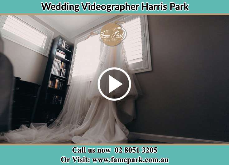 Bride wedding gown hang at the window Harris Park NSW 2150