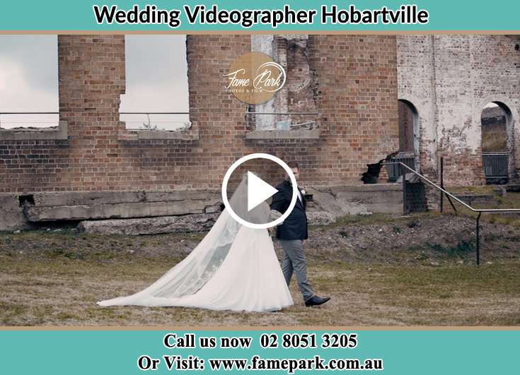 Bride and Groom walking at the ruins Hobartville NSW 2753