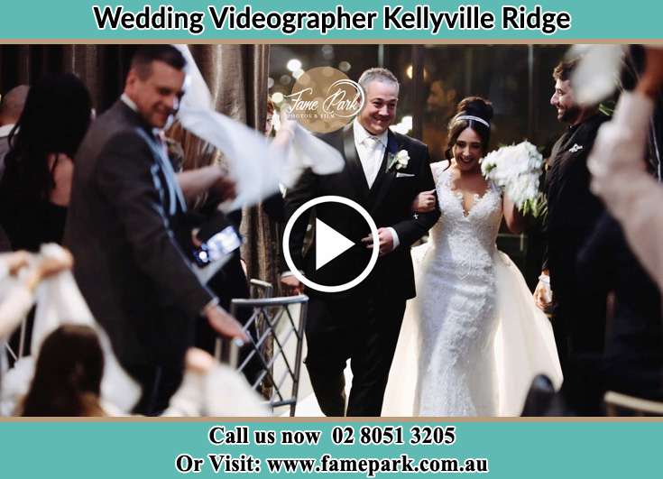 Bride and Groom walking through the crowds Kellyville Ridge NSW 2155