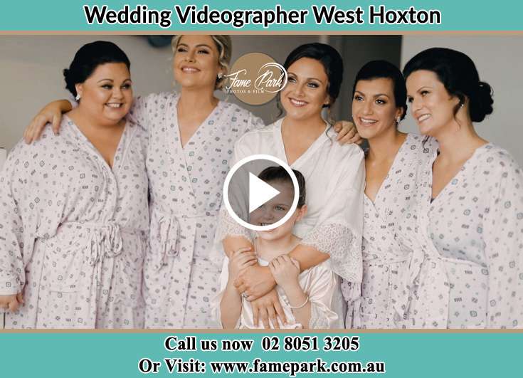 The Bride and her bridesmaids smiling for the camera West Hoxton NSW 2171