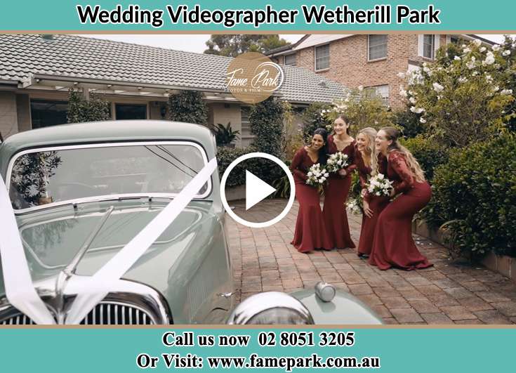 The bridesmaids looking at the bridal car Wetherill Park NSW 2164