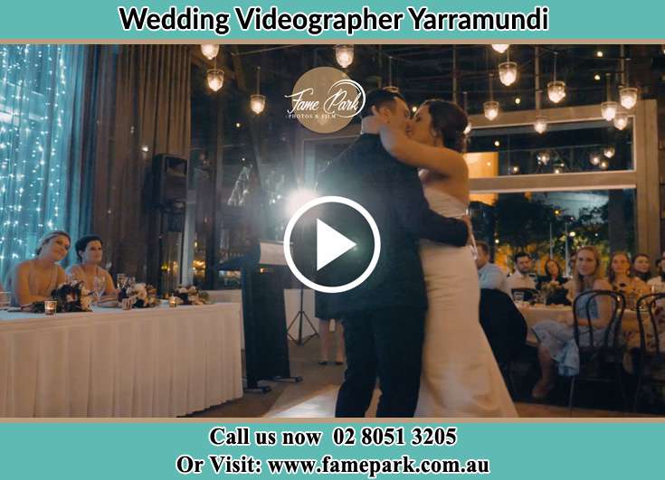 The newlyweds kissing on the dance floor Yarramundi NSW 2753